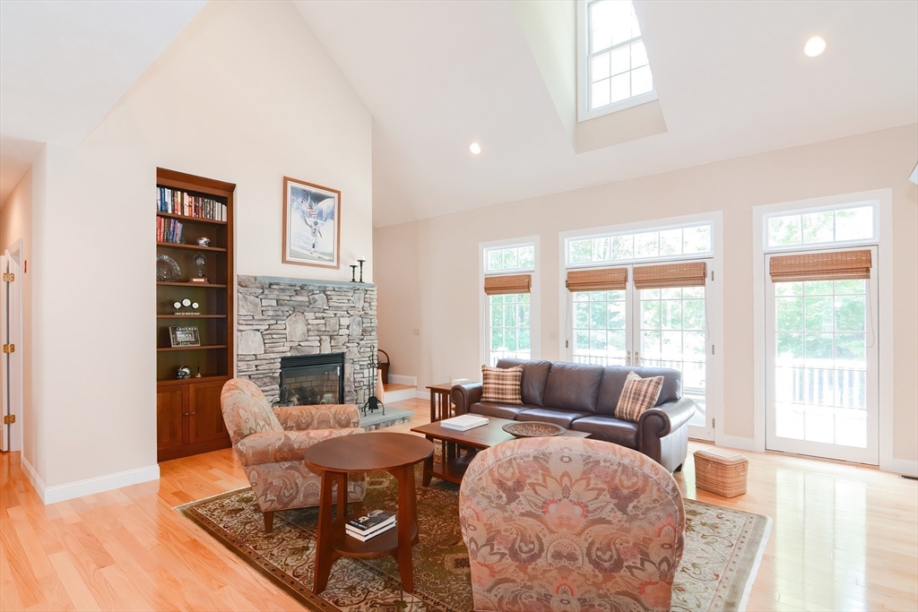 3 Freeman Place Mendon, MA 01756 - Photo 14 of 41 a living room with furniture and a fireplace
