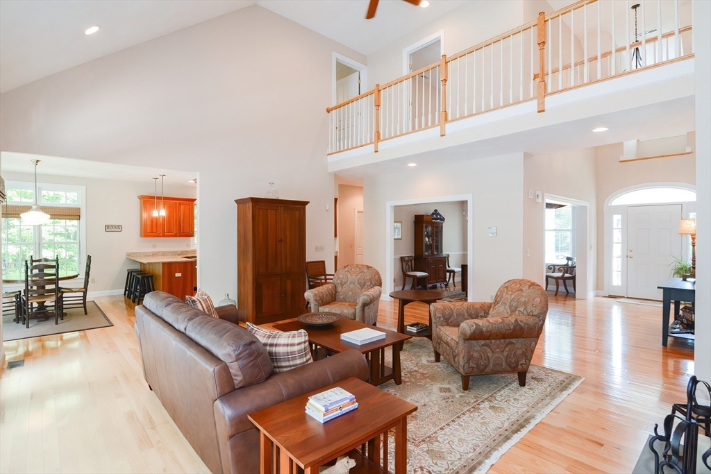 3 Freeman Place Mendon, MA 01756 - Photo 16 of 41 a living room with furniture kitchen view and a large window