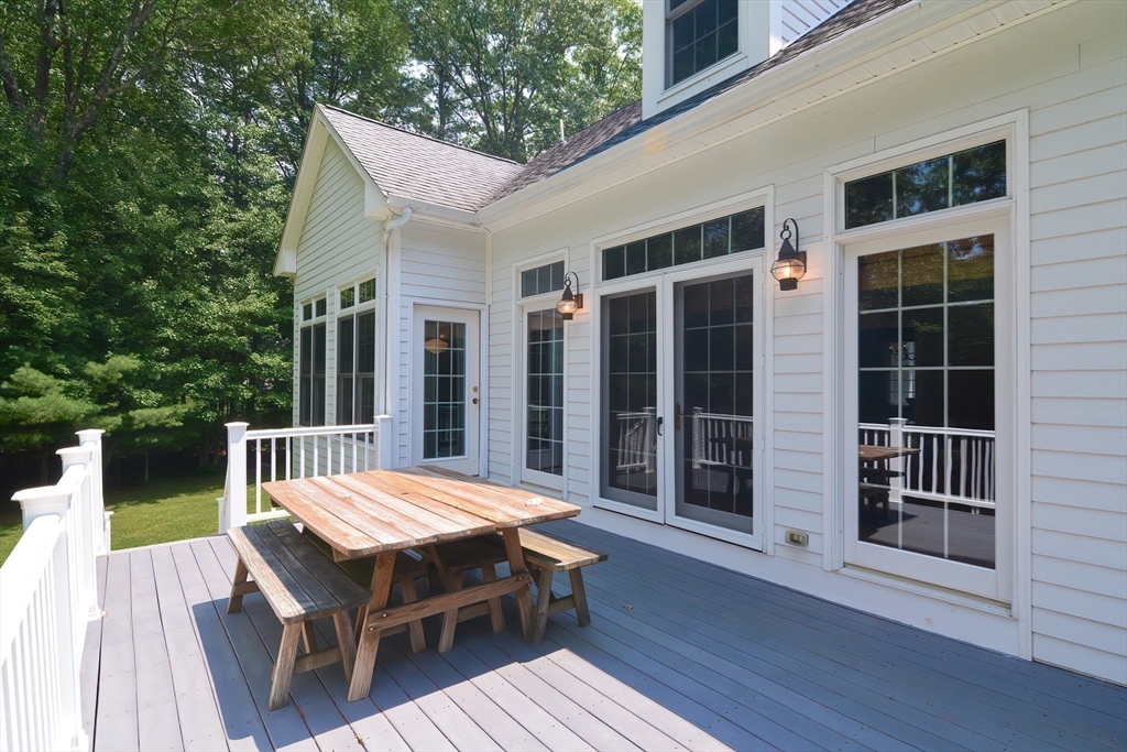 3 Freeman Place Mendon, MA 01756 - Photo 21 of 41 a view of backyard with deck and outdoor seating