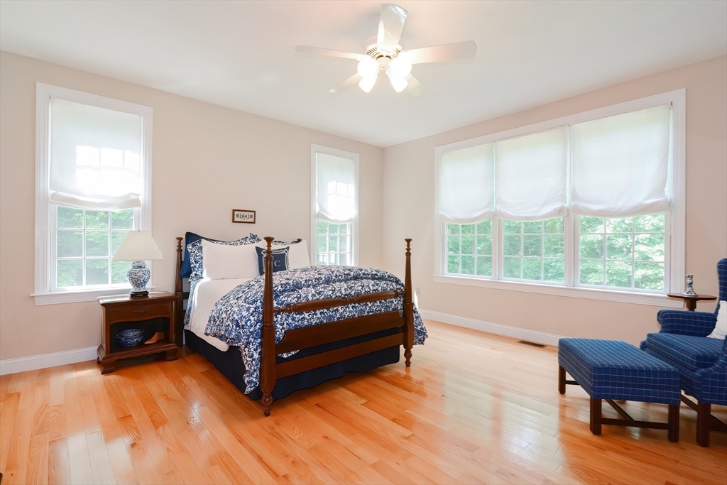 3 Freeman Place Mendon, MA 01756 - Photo 22 of 41 a bedroom with a bed window and a chair