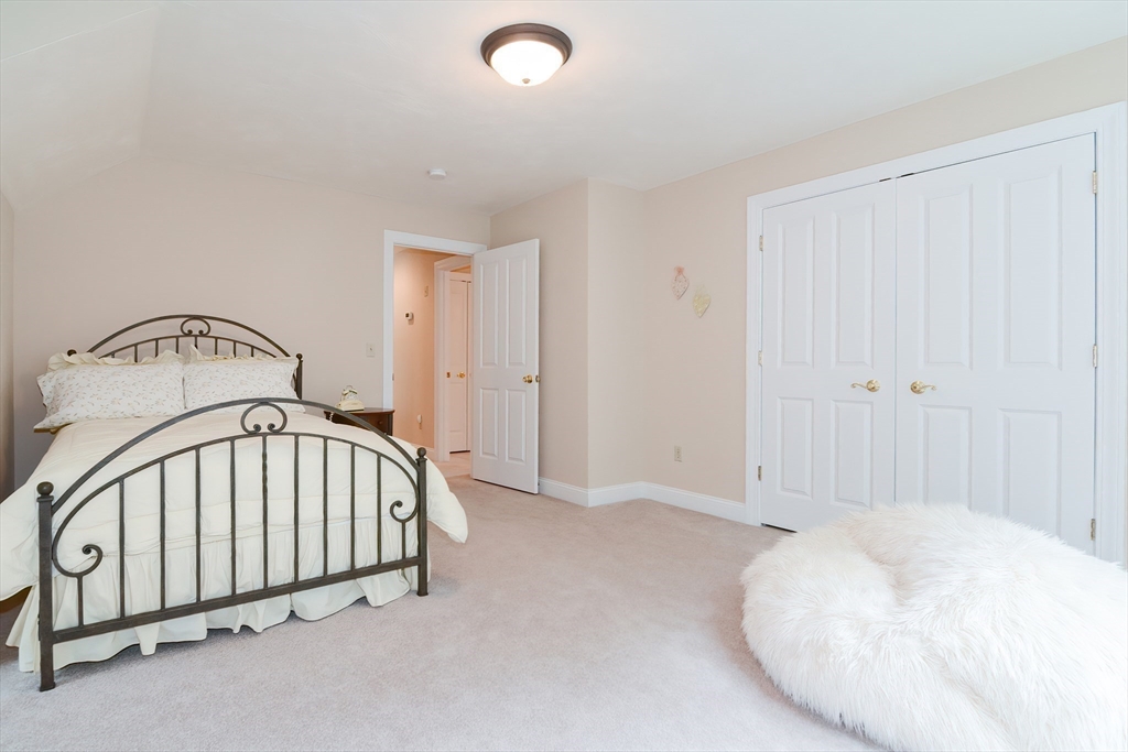 3 Freeman Place Mendon, MA 01756 - Photo 26 of 41 a view of a livingroom with a staircase
