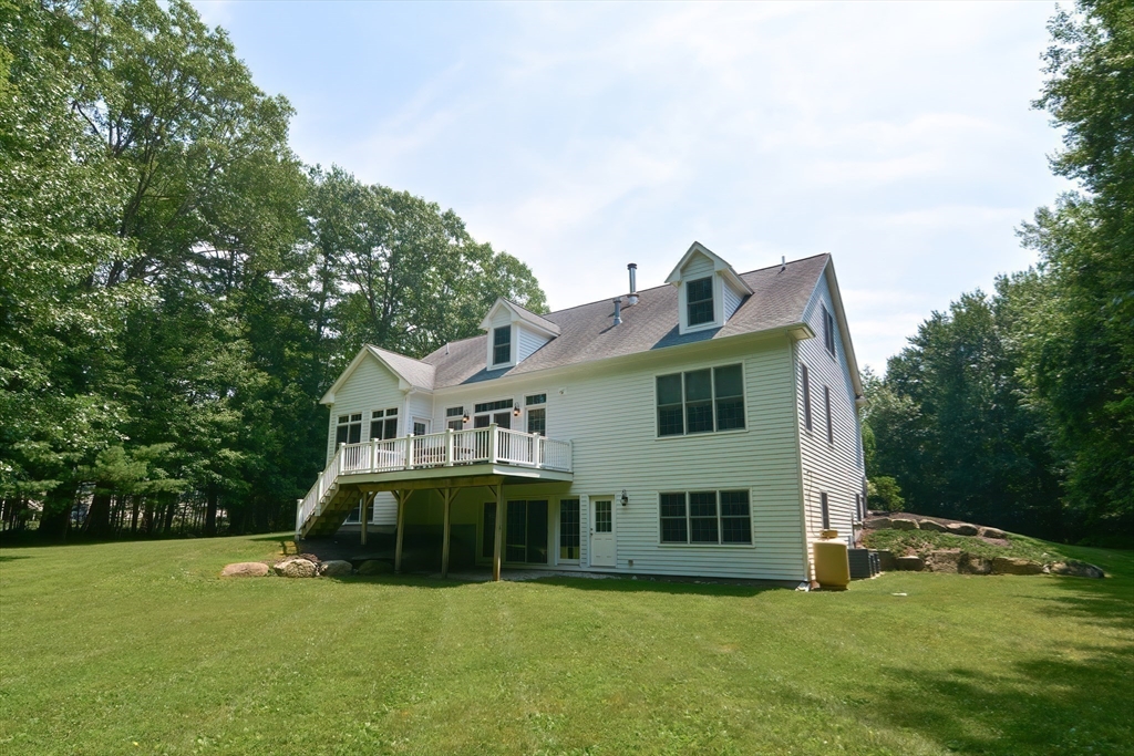 3 Freeman Place Mendon, MA 01756 - Photo 3 of 41 a view of a house with a yard