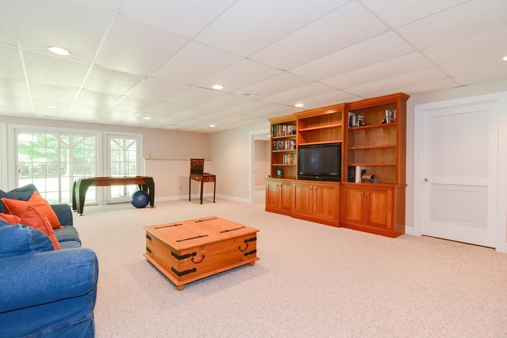 3 Freeman Place Mendon, MA 01756 - Photo 33 of 41 a living room with furniture and a flat screen tv