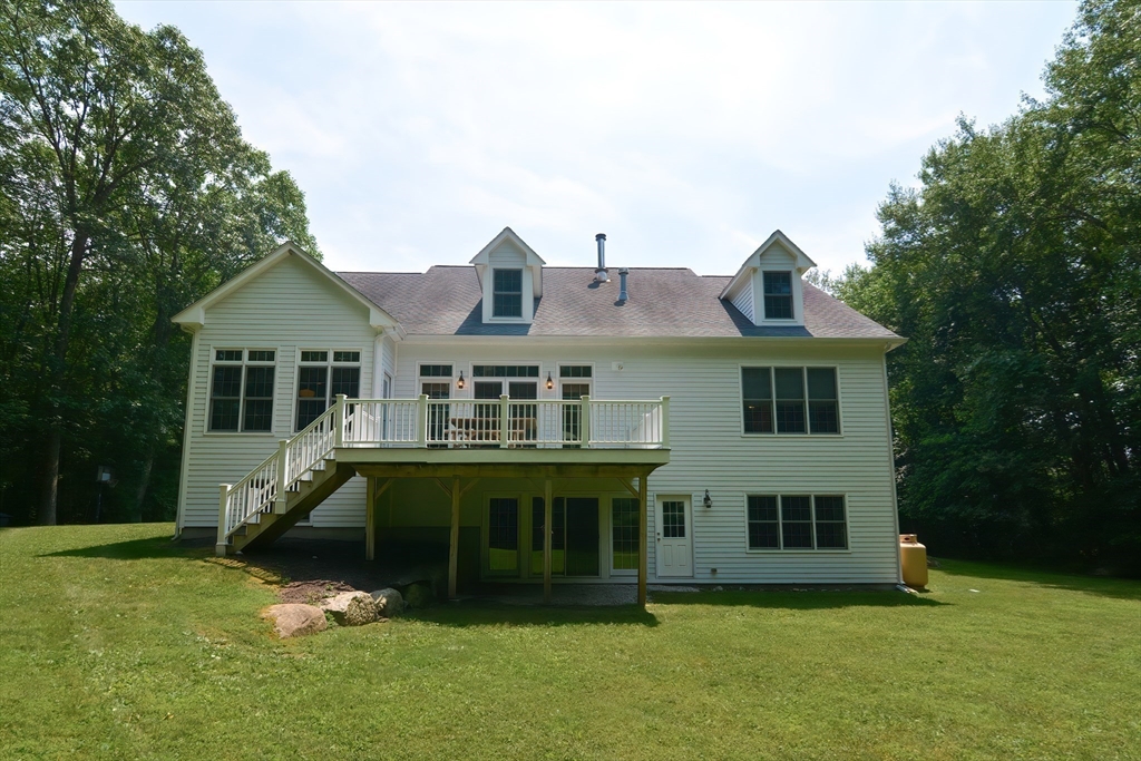 3 Freeman Place Mendon, MA 01756 - Photo 39 of 41 a front view of a house with a yard
