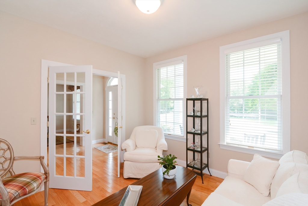 3 Freeman Place Mendon, MA 01756 - Photo 6 of 41 a living room with furniture and a table
