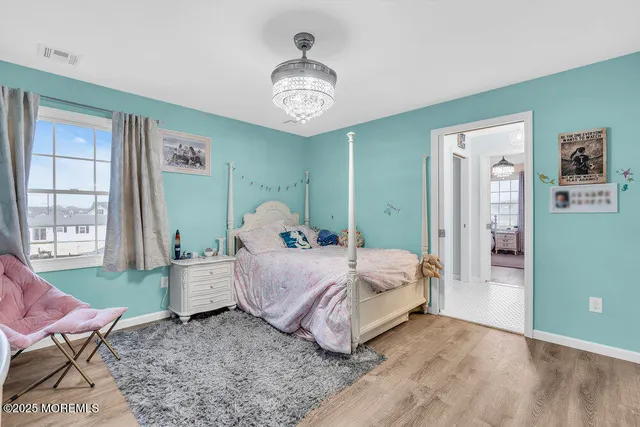 an aerial view of a house with a ocean view