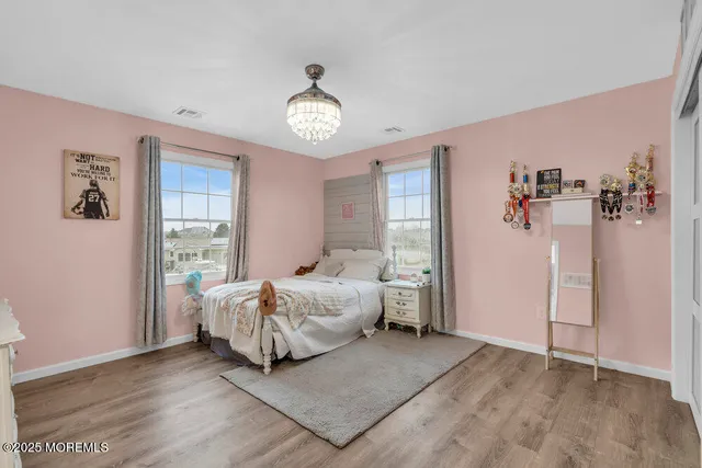 an aerial view of a house with an outdoor space