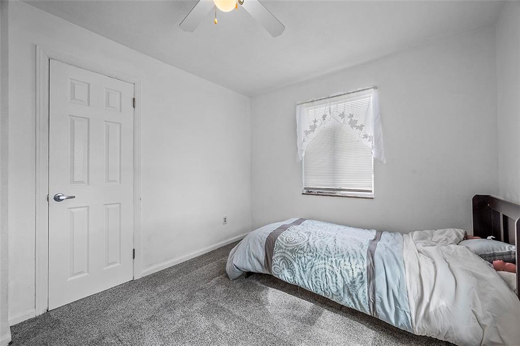 8 Ellen Drive McKees Rocks, PA 15136 - Photo 17 of 25 a bedroom with a bed and a window