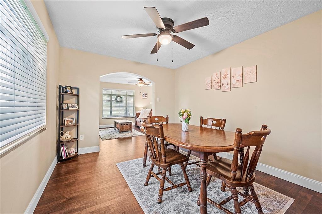 8 Ellen Drive McKees Rocks, PA 15136 - Photo 10 of 25 a view of a dining room with furniture and wooden floor
