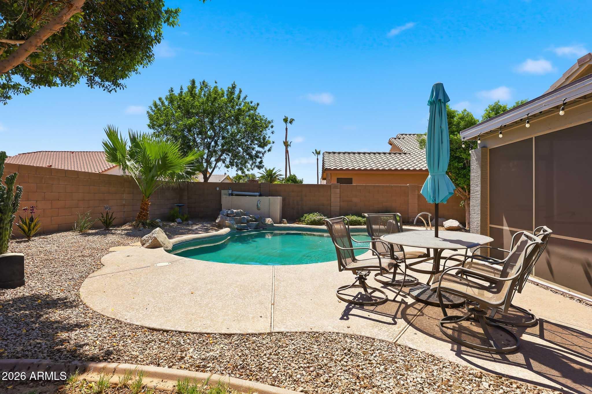 2153 East Kempton Road Chandler, AZ 85225 - Photo 26 of 50 a view of a backyard with sitting area