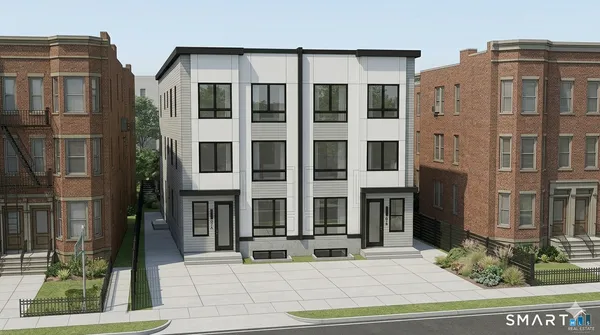 a view of a building with a window and brick walls