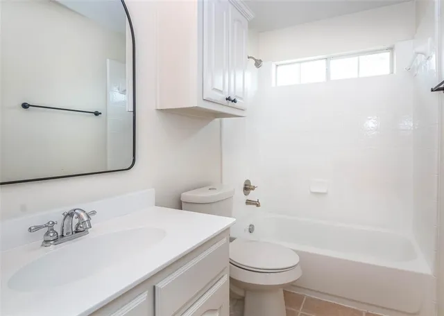 a view of backyard with tub