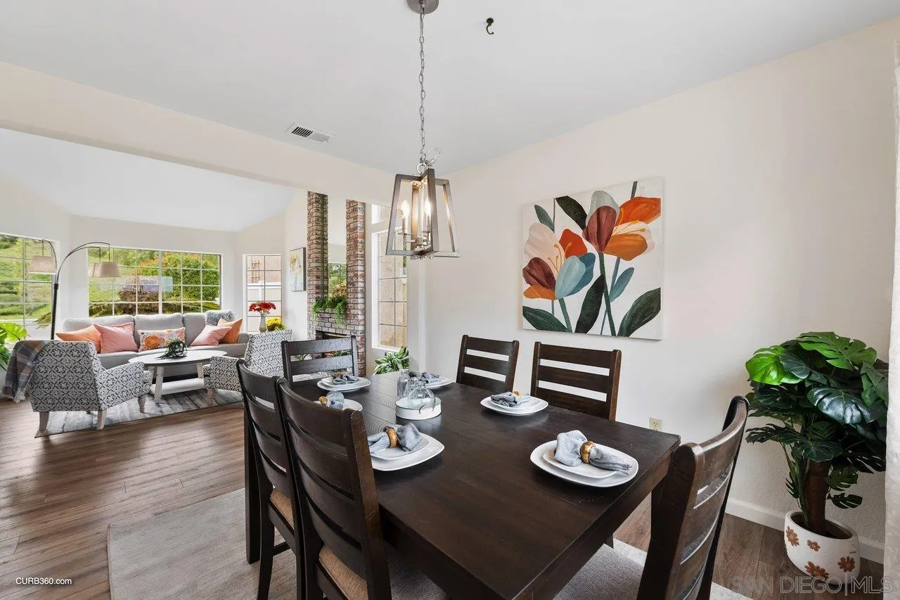 1373 Crestview Drive Oceanside, CA 92056 - Photo 14 of 33 a view of a dining room with furniture window and wooden floor