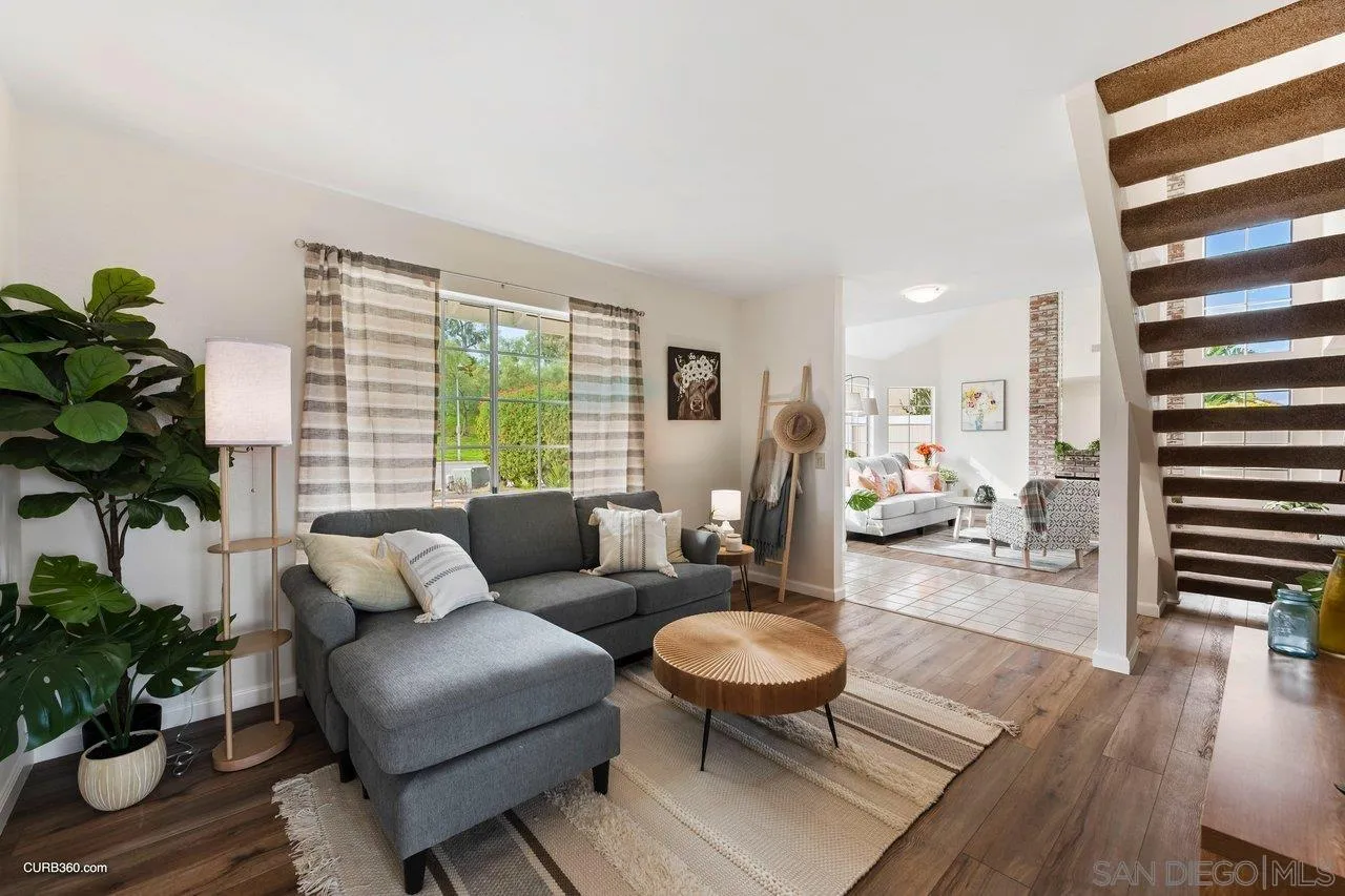 1373 Crestview Drive Oceanside, CA 92056 - Photo 21 of 33 a living room with furniture and a large window