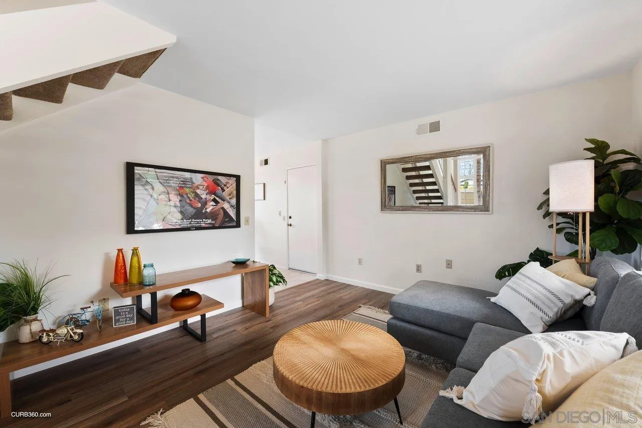 1373 Crestview Drive Oceanside, CA 92056 - Photo 23 of 33 a living room with furniture and a flat screen tv