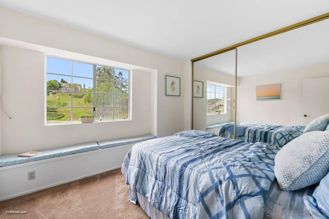 1373 Crestview Drive Oceanside, CA 92056 - Photo 29 of 33 a bedroom with a bed and a window