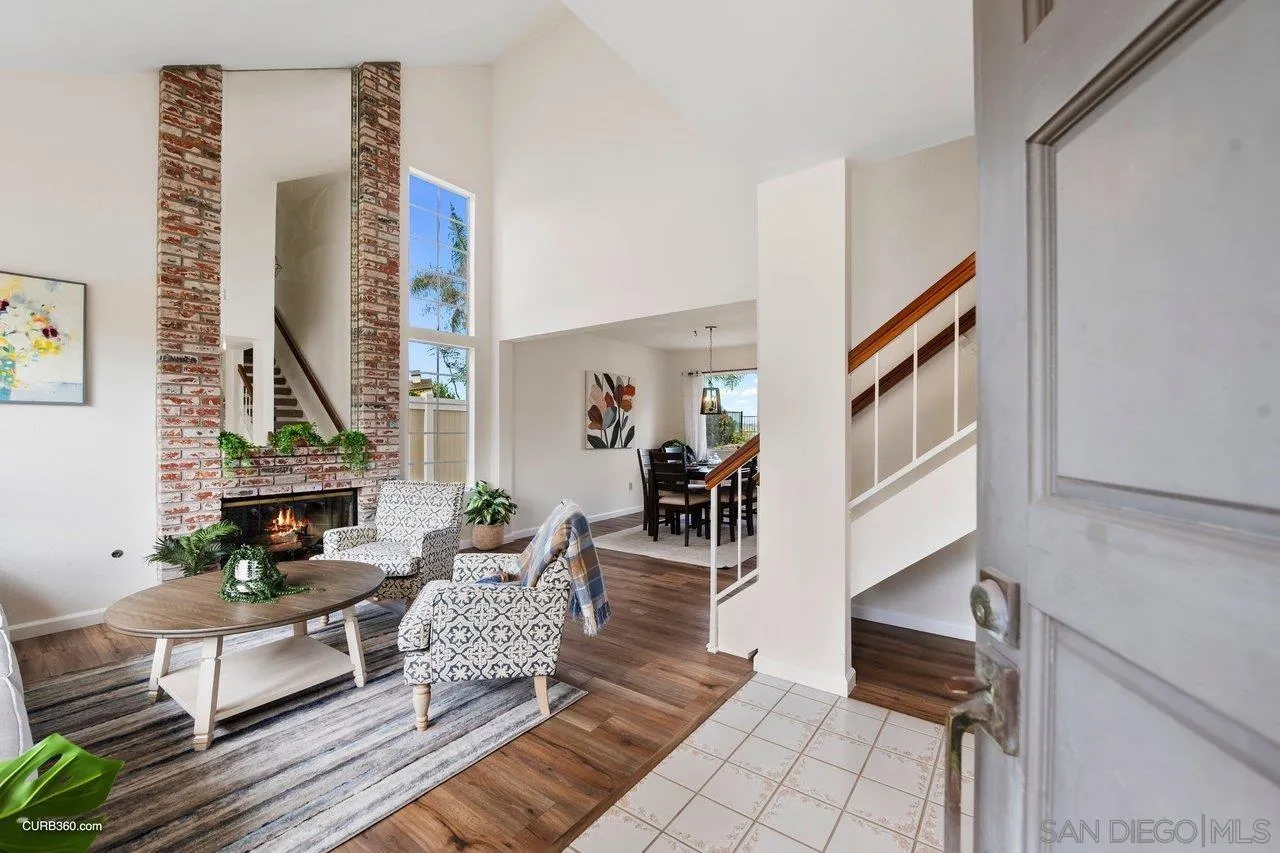 1373 Crestview Drive Oceanside, CA 92056 - Photo 7 of 33 a living room with furniture and floor to ceiling window