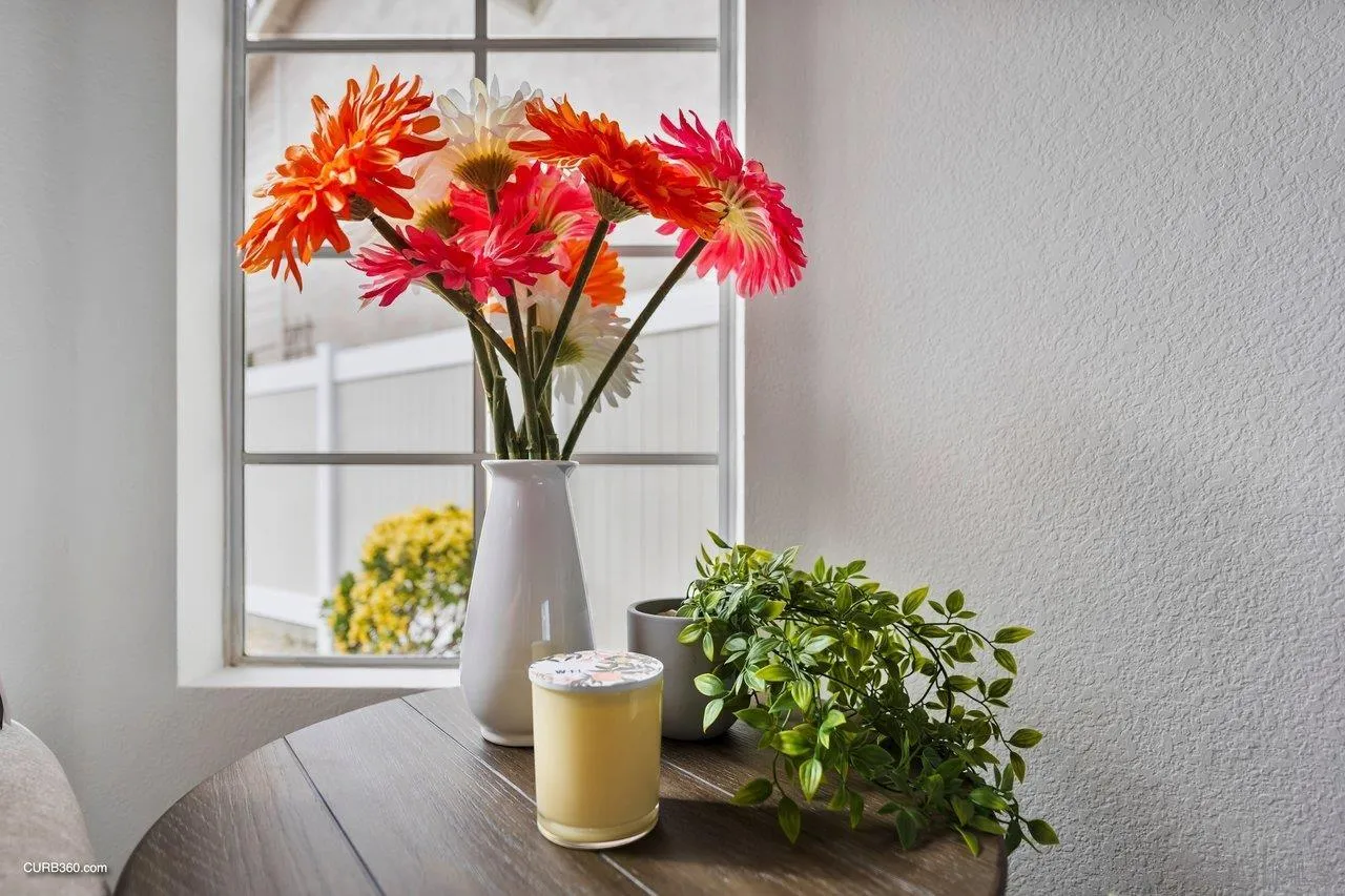 1373 Crestview Drive Oceanside, CA 92056 - Photo 9 of 33 a close up of a vase with flowers