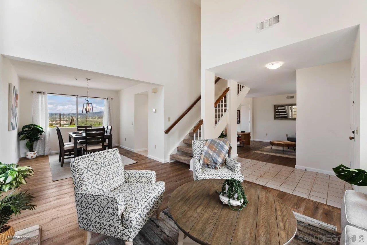 1373 Crestview Drive Oceanside, CA 92056 - Photo 10 of 33 a living room with furniture and wooden floor