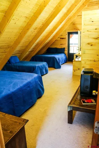 a view of a balcony with trees