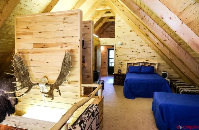 a view of a terrace with outdoor seating and city view