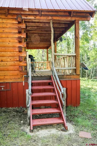 a view of balcony with wooden floor and outdoor space