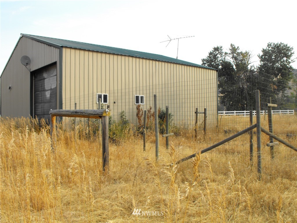 a view of swimming pool with outdoor seating