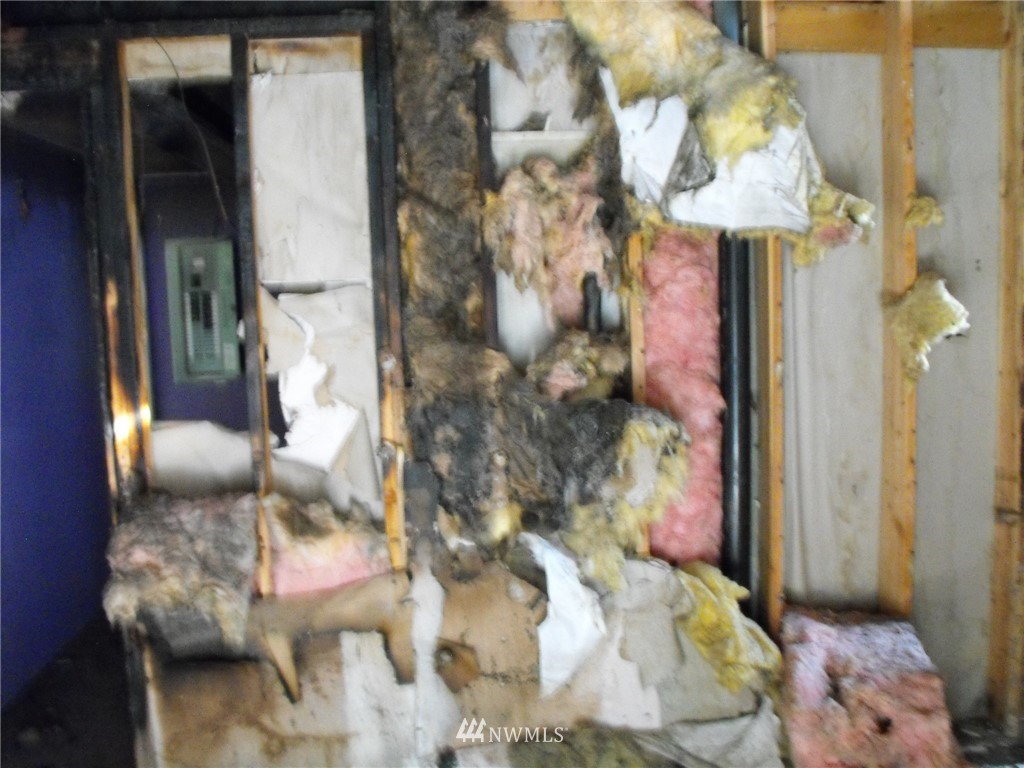 166 Gold Creek Loop Road Carlton, WA 98814 - Photo 3 of 4 a bathroom with a granite countertop shower and a mirror
