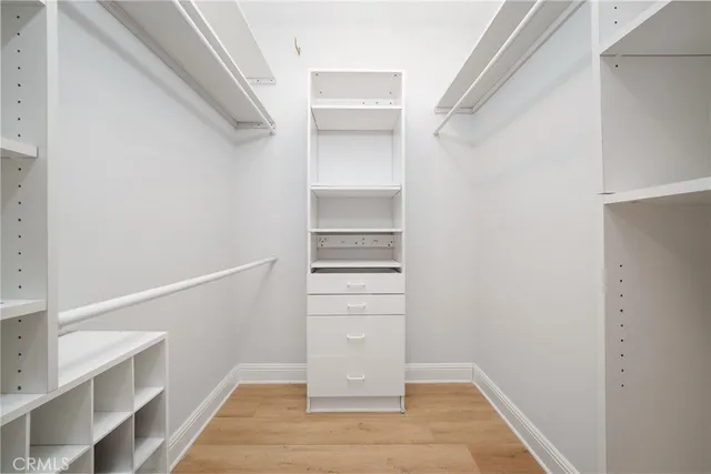 a view of an empty walk in closet