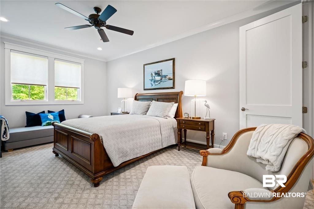 707 Cardamel Court Fairhope, AL 36532 - Photo 28 of 40 Carpeted bedroom with crown molding and ceiling fan