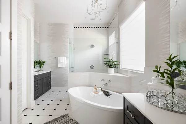 a bath room with a sink and a mirror
