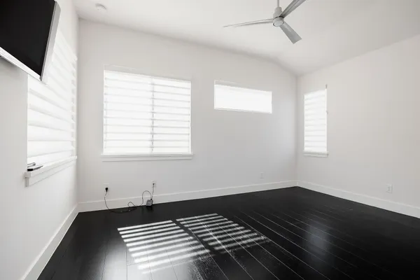 a view of wooden floor in an empty room