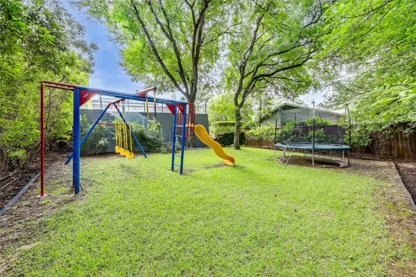 a view of a park with a slide