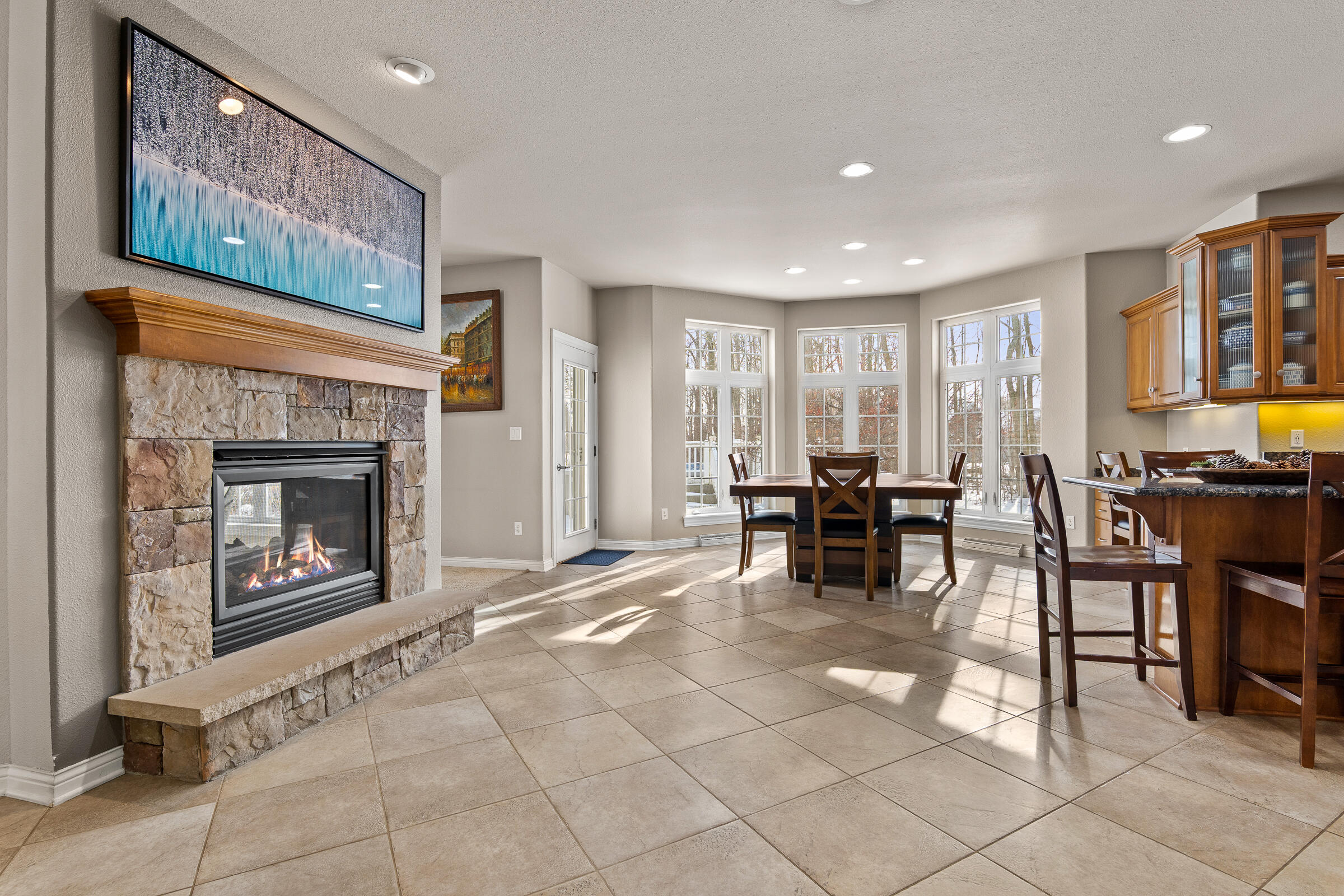 517 Oriole Lane Howards Grove, WI 53083 - Photo 6 of 68 Two Sided Fireplace