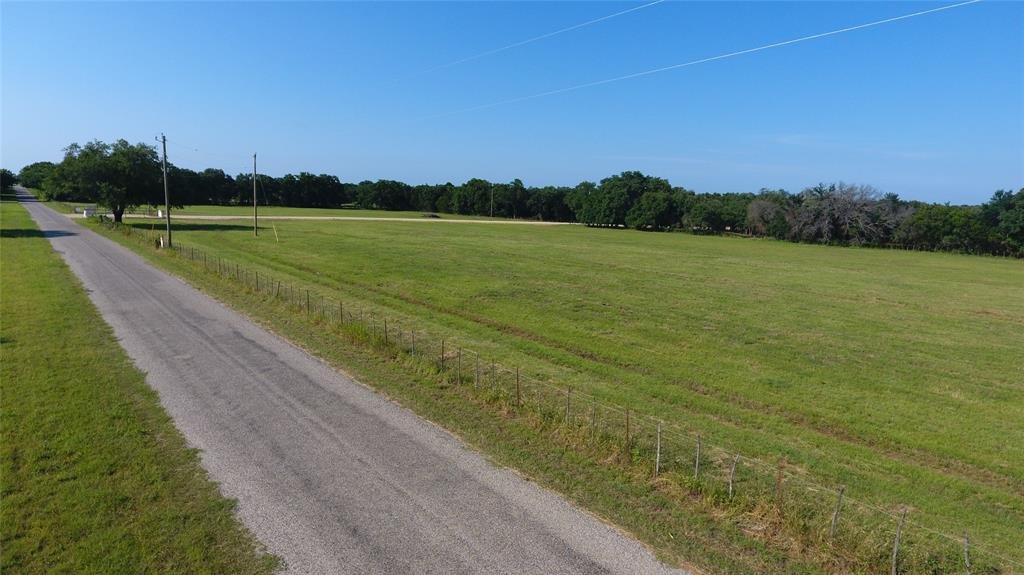 4750 Coleman Ranch Road Tolar, TX 76476 - Photo 10 of 16 a view of a lake with a big yard