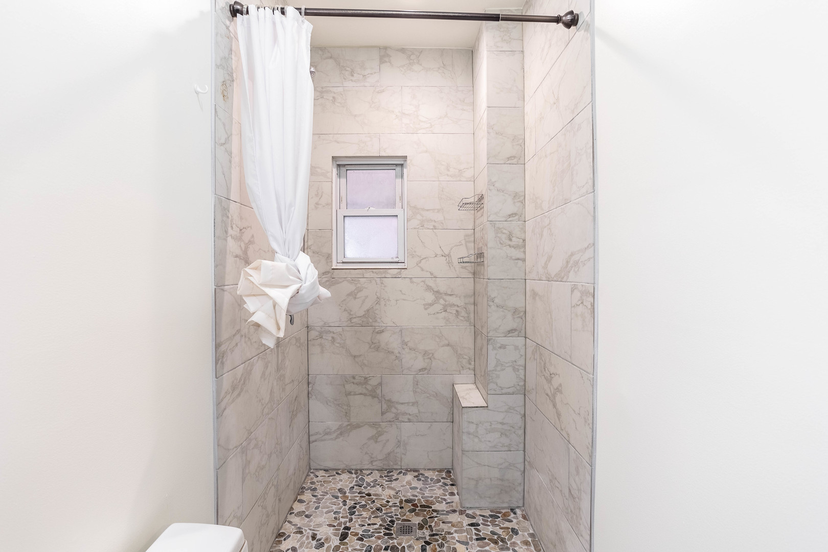 1115 West 17th Street, Unit 2F Chicago, IL 60608 - Photo 11 of 28 a bathroom with a shower and a toilet