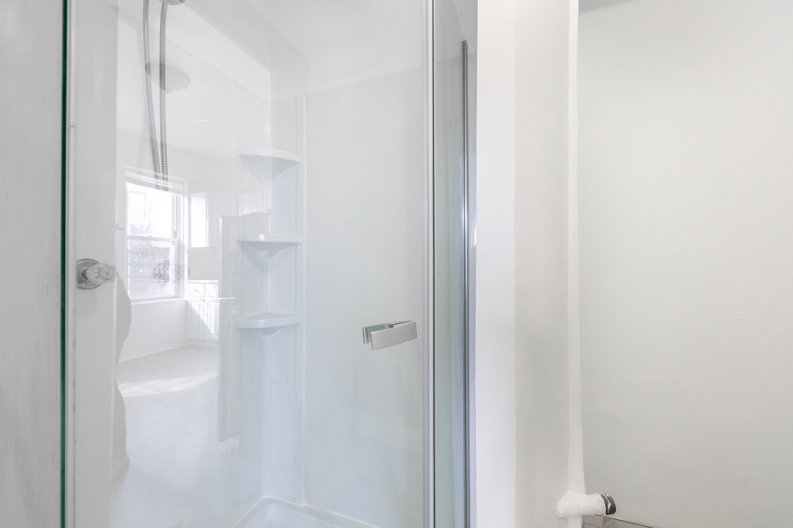 1115 West 17th Street, Unit 2F Chicago, IL 60608 - Photo 21 of 28 a bathroom with a glass shower door