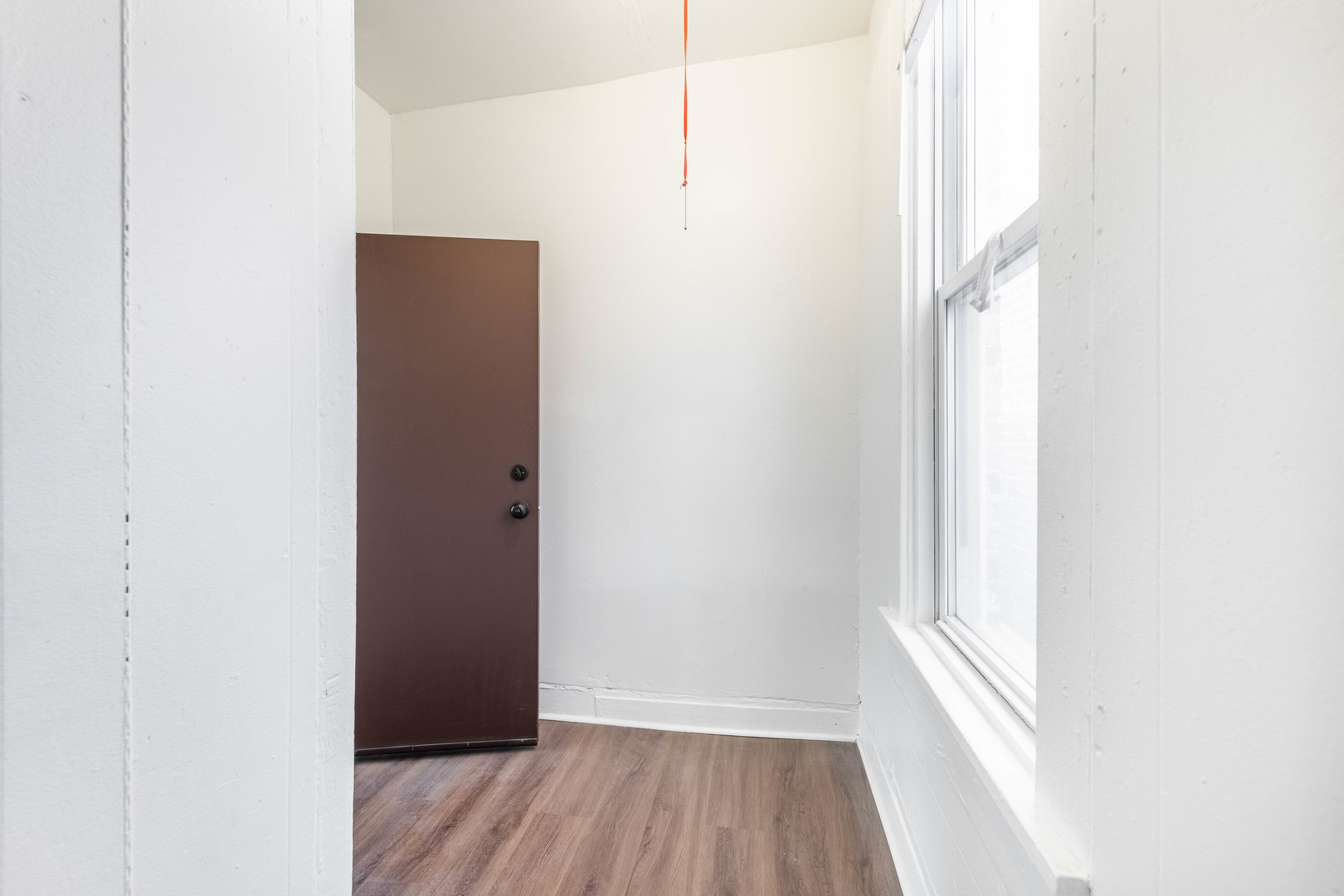 1115 West 17th Street, Unit 2F Chicago, IL 60608 - Photo 28 of 28 a view of a room with wooden floor