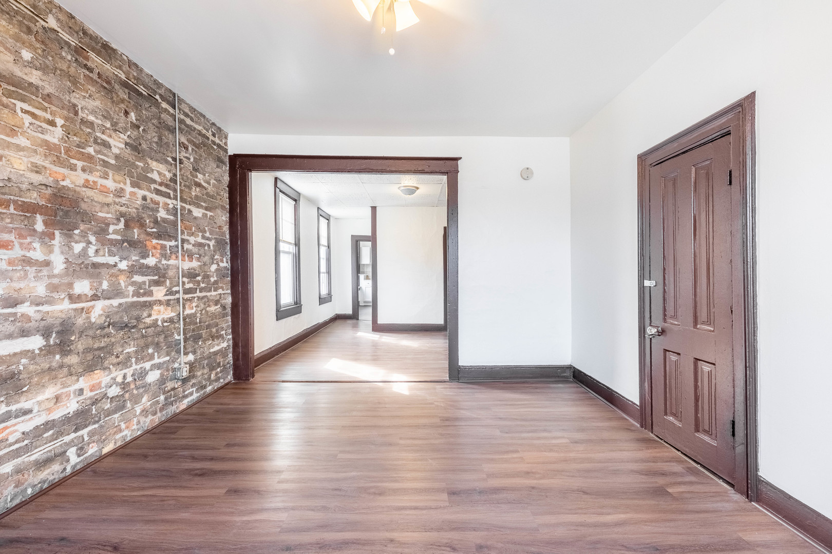 1115 West 17th Street, Unit 2F Chicago, IL 60608 - Photo 8 of 28 a view of livingroom with hardwood floor and hallway