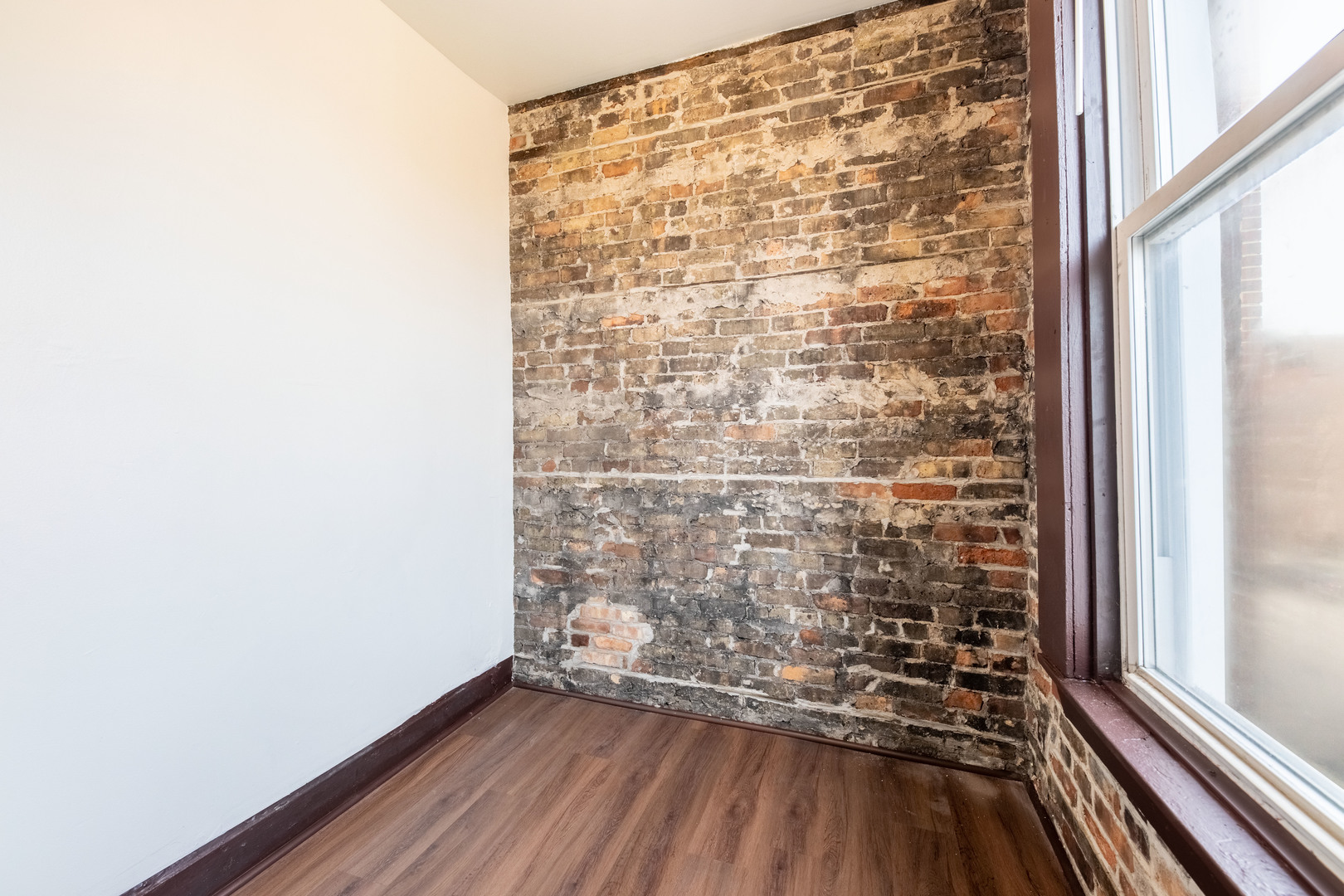 1115 West 17th Street, Unit 2F Chicago, IL 60608 - Photo 9 of 28 a view of wooden floor