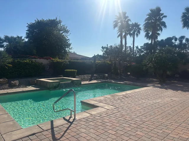 a view of a garden with a bench