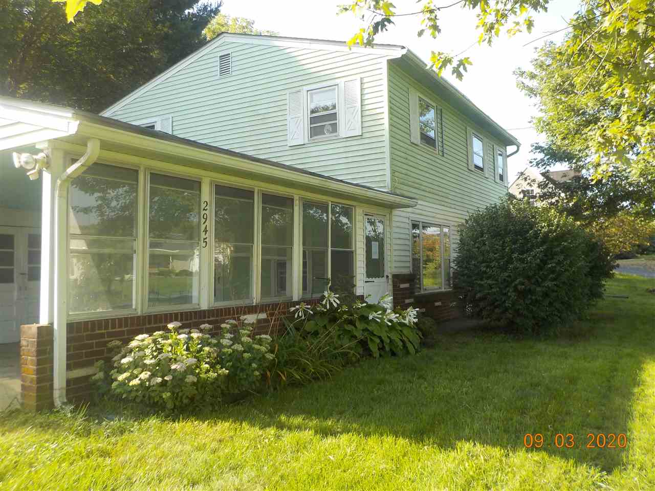 2945 Oak Ridge Road Mount Crawford, VA 22841 - Photo 1 of 19 a front view of a house with garden