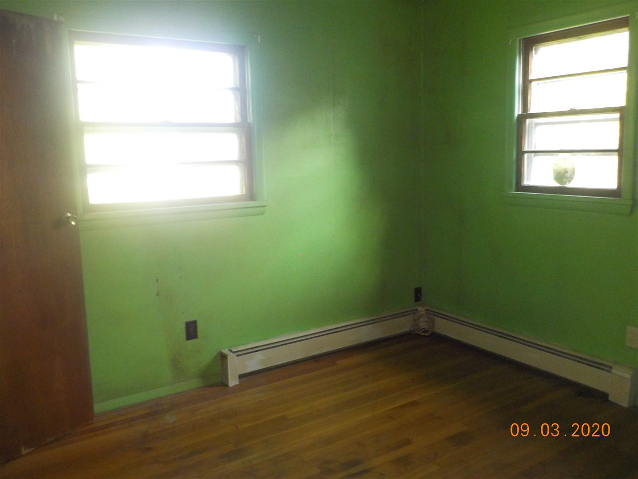 2945 Oak Ridge Road Mount Crawford, VA 22841 - Photo 10 of 19 an empty room with a window and a potted plant