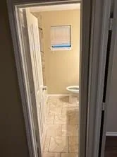 a bathroom with a toilet