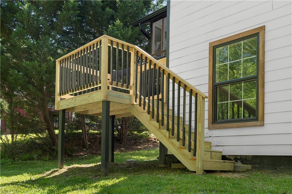 1271 Hayes Street Madison, GA 30650 - Photo 30 of 37 a view of a house with backyard and porch