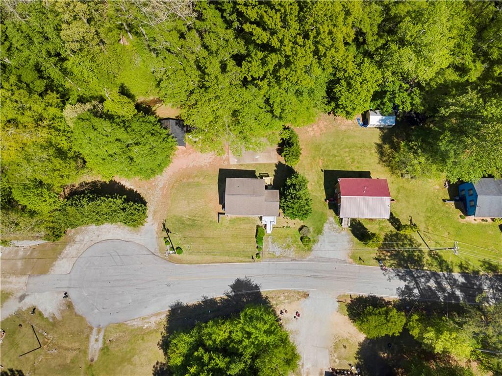 1271 Hayes Street Madison, GA 30650 - Photo 36 of 37 an aerial view of residential house with outdoor space and trees all around