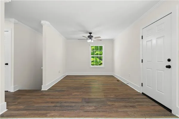a view of kitchen with wooden floor