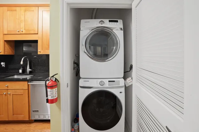 a utility room with dryer and washer