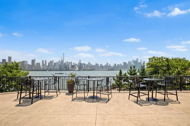 a view of a terrace with sitting area