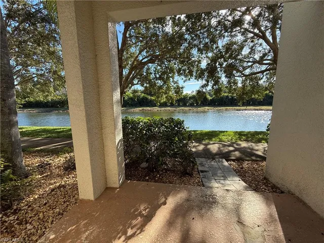 a view of a lake from a corridor